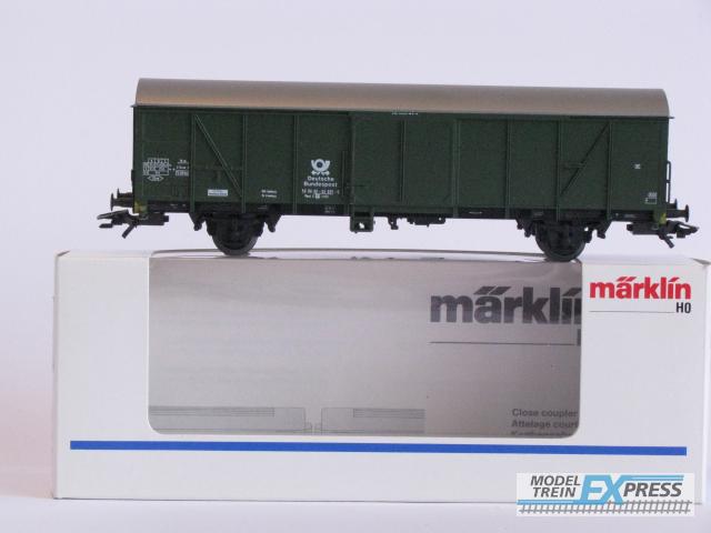Marklin gebruikt materiaal 4736 Gesloten goederen wagon van de Deutsche Bundes Post  groen met doos
