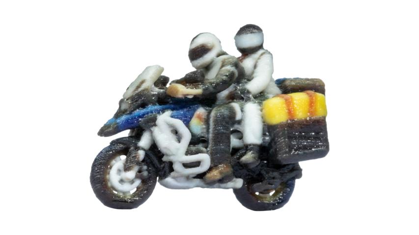 Noch 10900 Toermotorfiets bestuurder met passagier, rijdend (1:87)