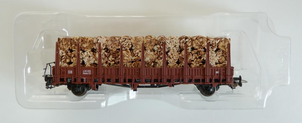 Piko gebruikt materiaal 54465 DR Rungenwagen Rmms33 Ep.3 m. Ladegut Holzschwarten z.g.a.n in doos