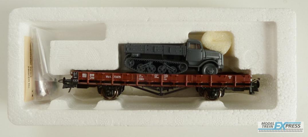 Roco gebruikt materiaal 47506 BMB CMD Flachwagen m. Kettenfahrzeug Ep.2 z.g.a.n in doos